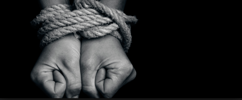 Image of hands tied. Courtesy of Operation Underground Railroad